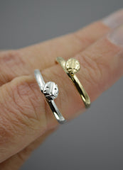 Silver and Gold ladybug ring being shown on finger